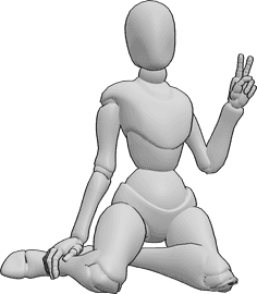 Referencia de poses- Postura de paz arrodillada - Mujer sentada de rodillas mostrando el signo de la paz con la mano izquierda.