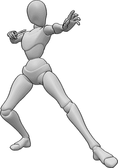 Referência de poses- Pose mágica da varinha de condão - A mulher feiticeira está de pé e lança um feitiço com a sua varinha de feiticeiro