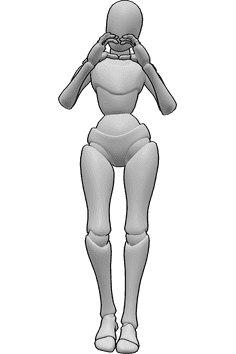 Referência de poses- Pose do dedo do coração - A mulher está de pé e faz um coração com as mãos