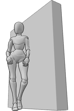 Riferimento alle pose- Posa femminile inclinata - La donna è in piedi, appoggiata al muro, con le mani in tasca.